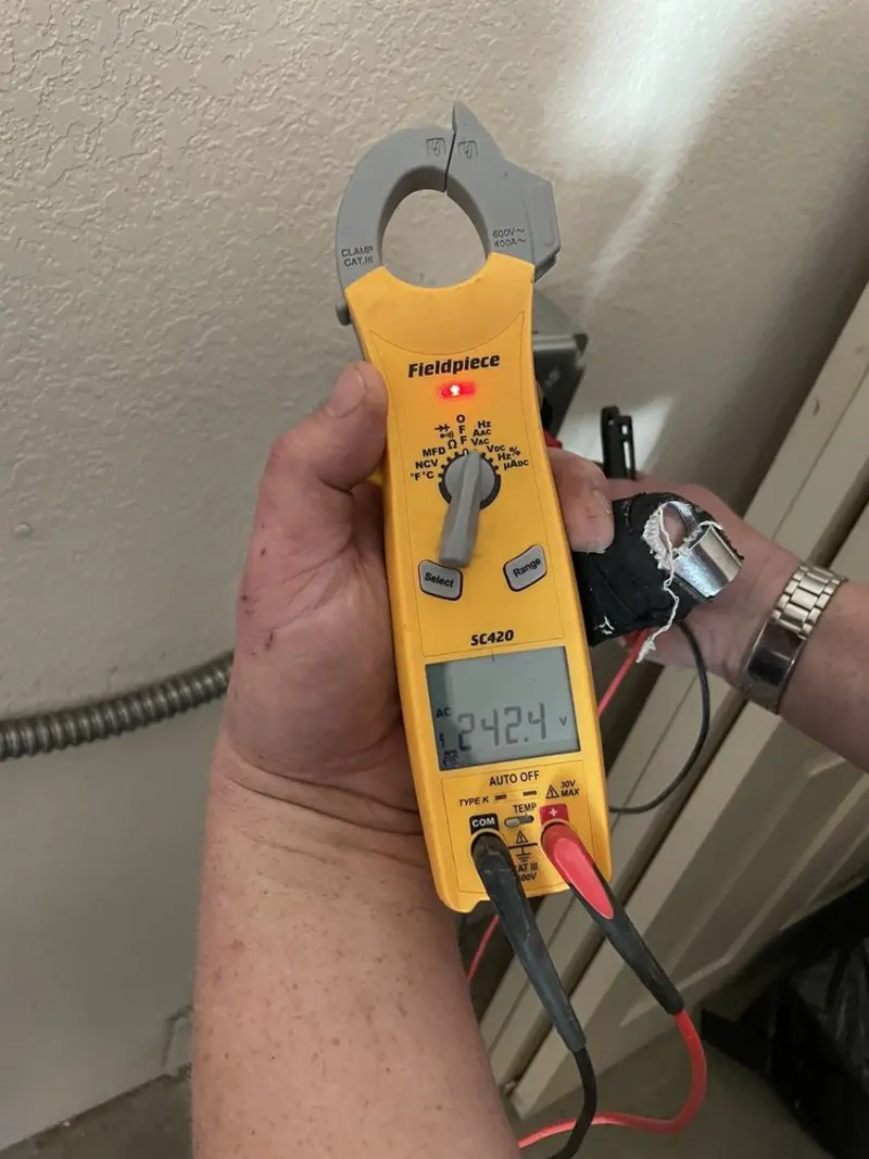 Voltage testing with clamp meter during Electrical Installation Services in Rosemount